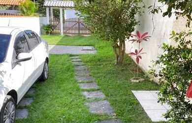 Imagem: A casa para temporada possui 3 Dormitórios, 3 Vagas na garagem