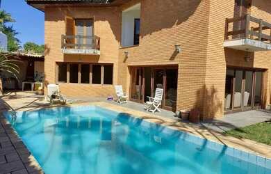 Imagem: A casa em condomínio possui 5 Dormitórios, 5 Banheiros, 4