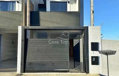 Imagem: A casa possui 3 Dormitórios, 3 Banheiros, 1 Vaga na garagem