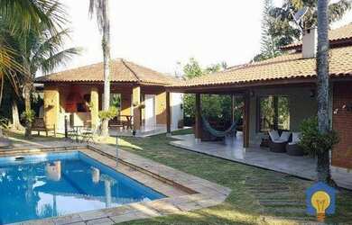 Imagem: A casa em condomínio possui 5 Dormitórios, 5 Banheiros, 4