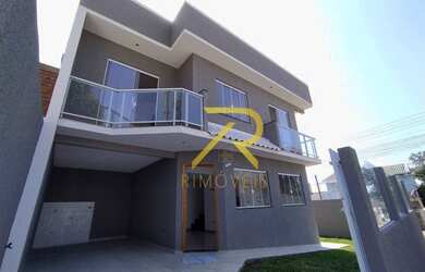 Imagem: A casa possui 3 Dormitórios, 1 Banheiro, 2 Vagas na garagem