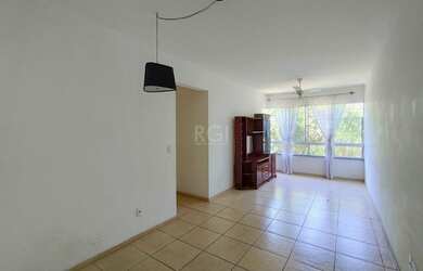 Imagem: O apartamento possui 3 Dormitórios, 1 Banheiro, 1 Vaga na garagem