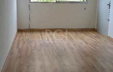 Imagem: O apartamento possui 3 Dormitórios, 1 Banheiro, 1 Vaga na garagem