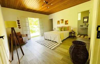 Imagem: A casa possui 4 Dormitórios, 5 Banheiros, 5 Vagas na garagem