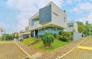 Imagem: A casa em condomínio possui 4 Dormitórios, 5 Banheiros, 4