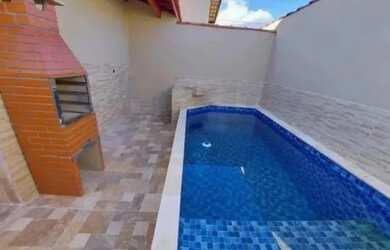 Imagem: A casa possui 2 Dormitórios, 2 Banheiros, 1 Vaga na garagem