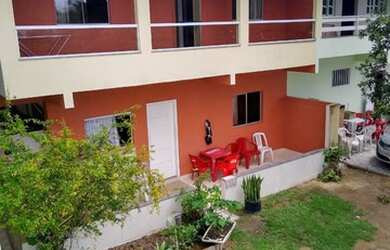 Imagem: A casa possui 2 Dormitórios, 3 Vagas na garagem e está localizado