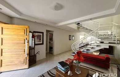 Imagem: A casa em condomínio possui 4 Dormitórios, 4 Banheiros, 2