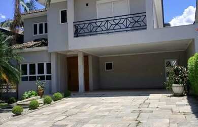 Imagem: A casa em condomínio possui 4 Dormitórios, 5 Banheiros, 4