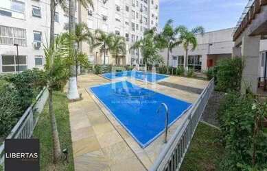 Imagem: O apartamento possui 2 Dormitórios, 2 Banheiros, 1 Vaga na