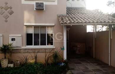 Imagem: A casa possui 3 Dormitórios, 2 Banheiros, 1 Vaga na garagem