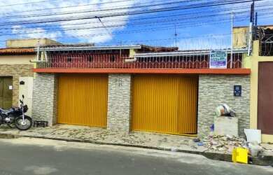 Imagem: A casa possui 3 Dormitórios, 2 Banheiros, 3 Vagas na garagem