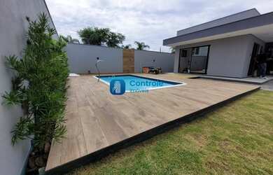 Imagem: A casa possui 2 Dormitórios, 3 Banheiros, 3 Vagas na garagem