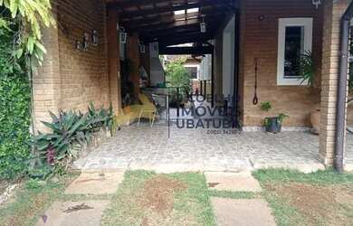 Imagem: A casa possui 5 Dormitórios, 4 Banheiros, 3 Vagas na garagem