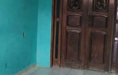 Imagem: A casa possui 2 Dormitórios, 1 Banheiro, 1 Vaga na garagem