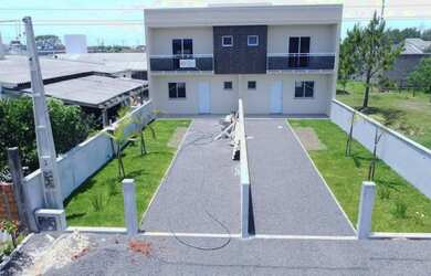 Imagem: A casa possui 3 Dormitórios, 3 Banheiros, 2 Vagas na garagem