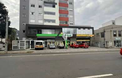 Imagem: O apartamento possui 3 Dormitórios, 1 Banheiro, 2 Vagas na