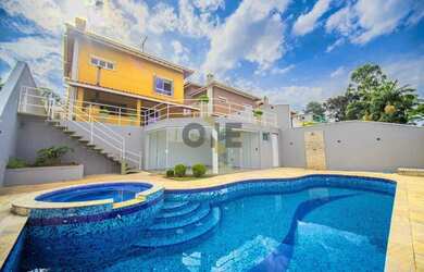 Imagem: A casa em condomínio à venda possui 4 Dormitórios, 4 Banheiros