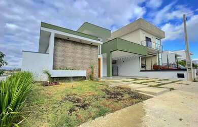 Imagem: A casa possui 3 Dormitórios, 3 Banheiros, 4 Vagas na garagem