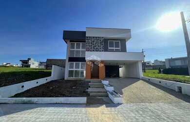 Imagem: A casa em condomínio possui 3 Dormitórios, 3 Banheiros, 2