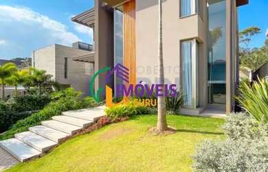 Imagem: A casa em condomínio possui 4 Dormitórios, 4 Banheiros, 4