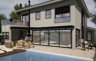 Imagem: A casa em condomínio possui 4 Dormitórios, 5 Banheiros, 5