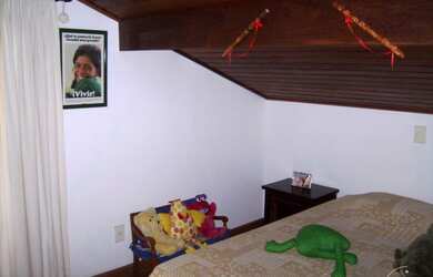 Imagem 7: Casa em Guarujá. Churrasqueira, Varanda, Área de serviçoeLareira