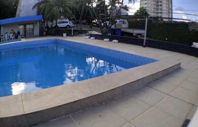 Imagem: A casa possui 3 Dormitórios, 4 Banheiros, 2 Vagas na garagem