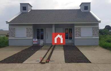 Imagem: A casa possui 2 Dormitórios, 1 Banheiro, 2 Vagas na garagem