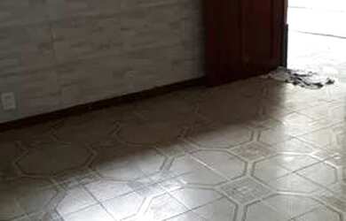 Imagem: A casa possui 2 Dormitórios, 1 Banheiro, 2 Vagas na garagem