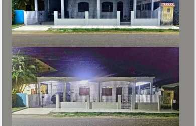 Imagem: A casa possui 3 Dormitórios, 2 Banheiros, 3 Vagas na garagem