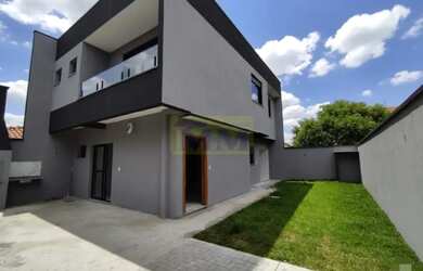 Imagem: A casa possui 3 Dormitórios, 3 Banheiros, 3 Vagas na garagem