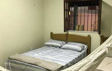 Imagem: A casa possui 3 Dormitórios, 3 Banheiros, 2 Vagas na garagem