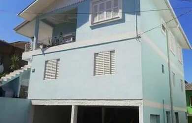 Imagem: A casa possui 5 Dormitórios, 4 Banheiros e 4 Vagas na garagem