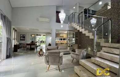 Imagem: A casa em condomínio possui 4 Dormitórios, 5 Banheiros, 2