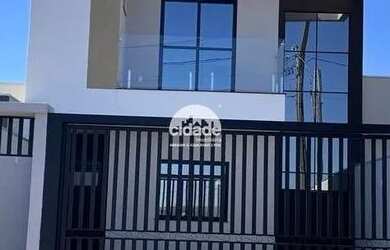 Imagem: A casa possui 2 Dormitórios, 3 Banheiros, 2 Vagas na garagem