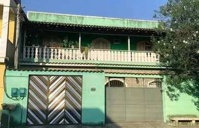 Imagem: A casa possui 2 Dormitórios, 2 Banheiros, 2 Vagas na garagem