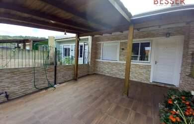 Imagem: A casa possui 2 Dormitórios, 1 Banheiro, 1 Vaga na garagem