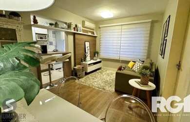 Imagem: O apartamento possui 1 Dormitório, 1 Banheiro, 1 Vaga na garagem