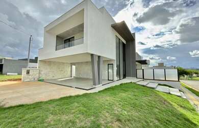 Imagem: A casa possui 4 Dormitórios, 5 Banheiros, 5 Vagas na garagem