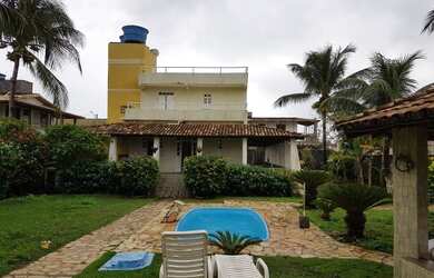 Imagem: A casa possui 5 Dormitórios, 5 Banheiros, 5 Vagas na garagem