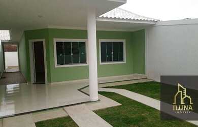 Imagem: A casa possui 3 Dormitórios, 2 Banheiros, 1 Vaga na garagem