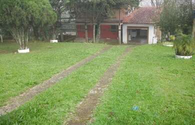 Imagem: A casa possui 2 Dormitórios, 2 Banheiros, 1 Vaga na garagem