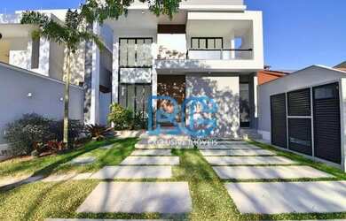 Imagem: A casa em condomínio possui 4 Dormitórios, 5 Banheiros e 290m²