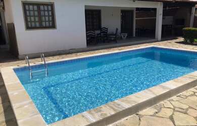 Imagem: A casa possui 4 Dormitórios, 4 Vagas na garagem e está localizado