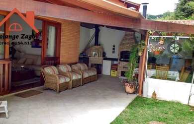 Imagem: A casa possui 5 Dormitórios, 5 Banheiros, 5 Vagas na garagem