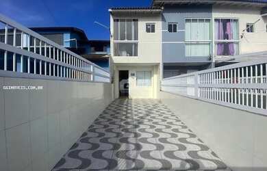 Imagem: A casa possui 2 Dormitórios, 3 Banheiros, 1 Vaga na garagem