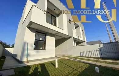 Imagem: A casa possui 3 Dormitórios, 2 Banheiros, 2 Vagas na garagem