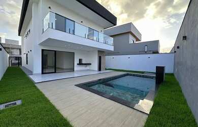 Imagem: A casa em condomínio possui 4 Dormitórios, 5 Banheiros, 4