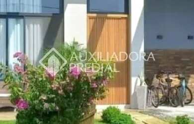 Imagem: A casa possui 4 Dormitórios, 5 Banheiros, 1 Vaga na garagem